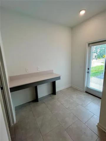 a room with table and window