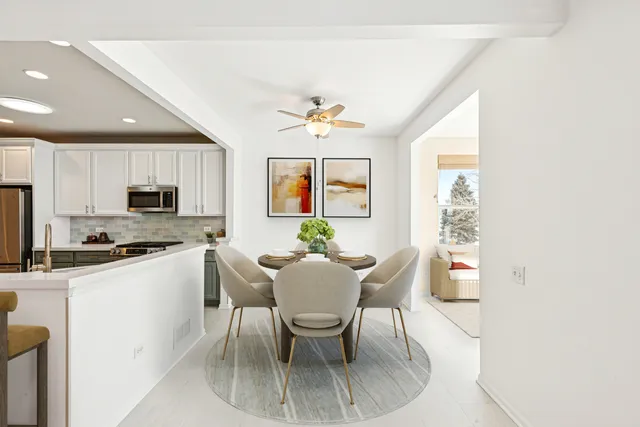 a bedroom with a bed and glass windows