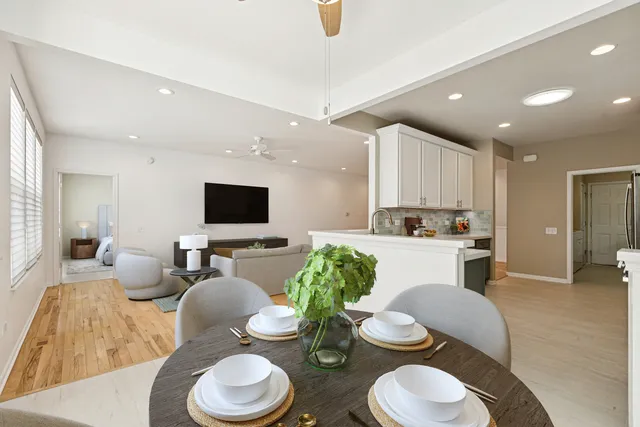 a spacious bathroom with bathtub and window