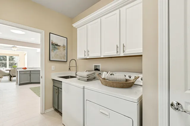 a bathroom with a granite countertop shower and a toilet