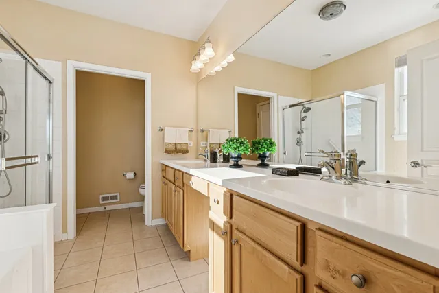 a view of a hallway with closet and toys