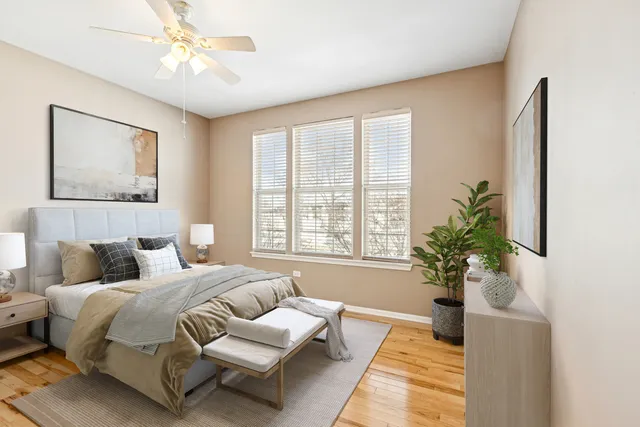 a view of a workspace with furniture and a potted plant
