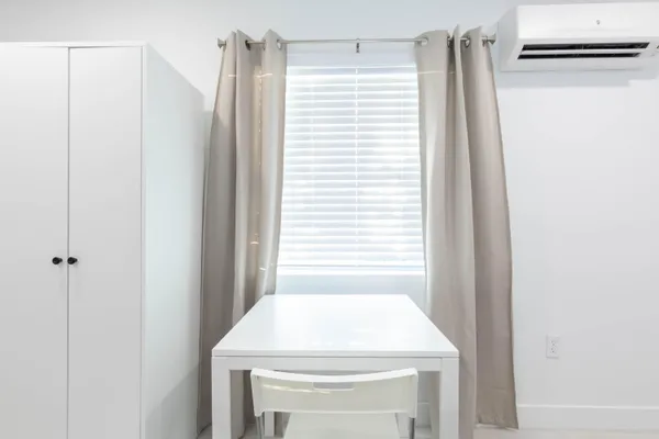 a bathroom with a sink and a shower