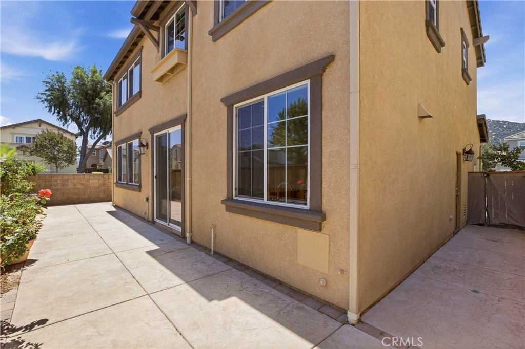 31598-31598 Six Rivers Court Temecula, CA 92592 - Photo 39 of 43 a view of a brick house with a hallway