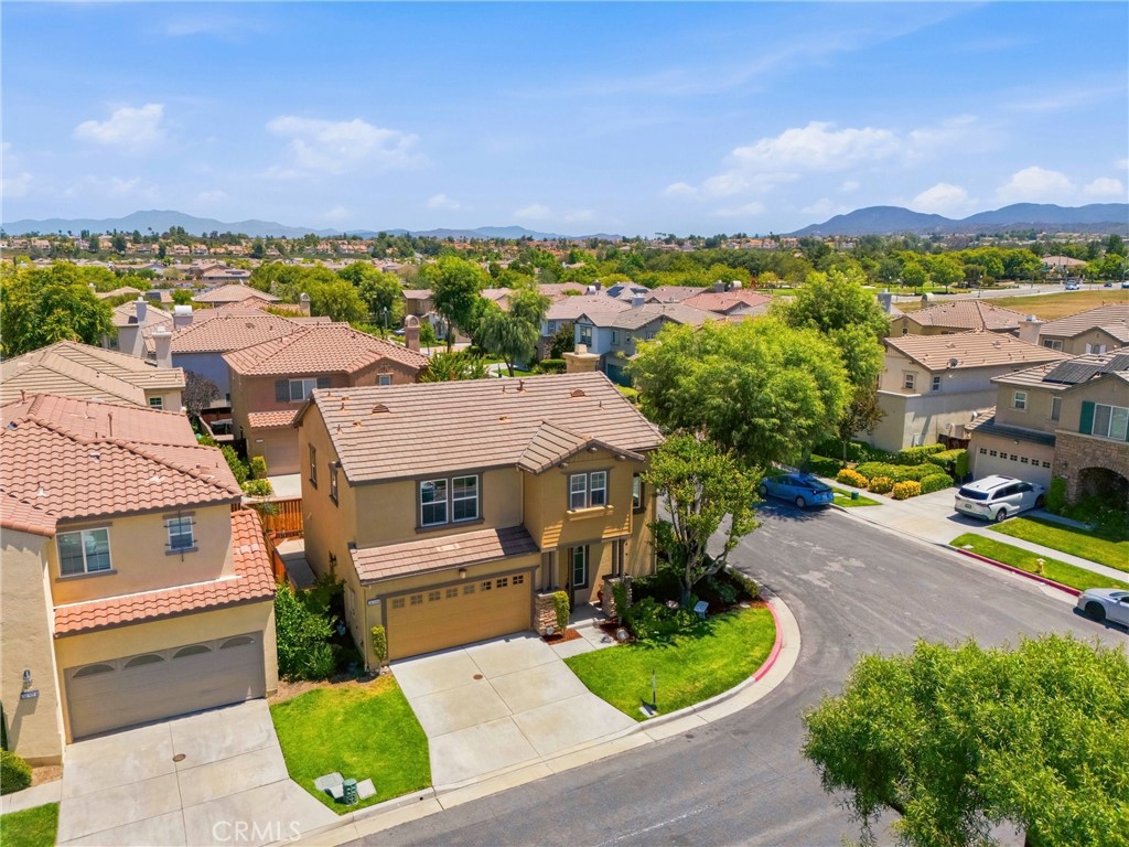 31598-31598 Six Rivers Court Temecula, CA 92592 - Photo 42 of 43 an aerial view of a house with a garden