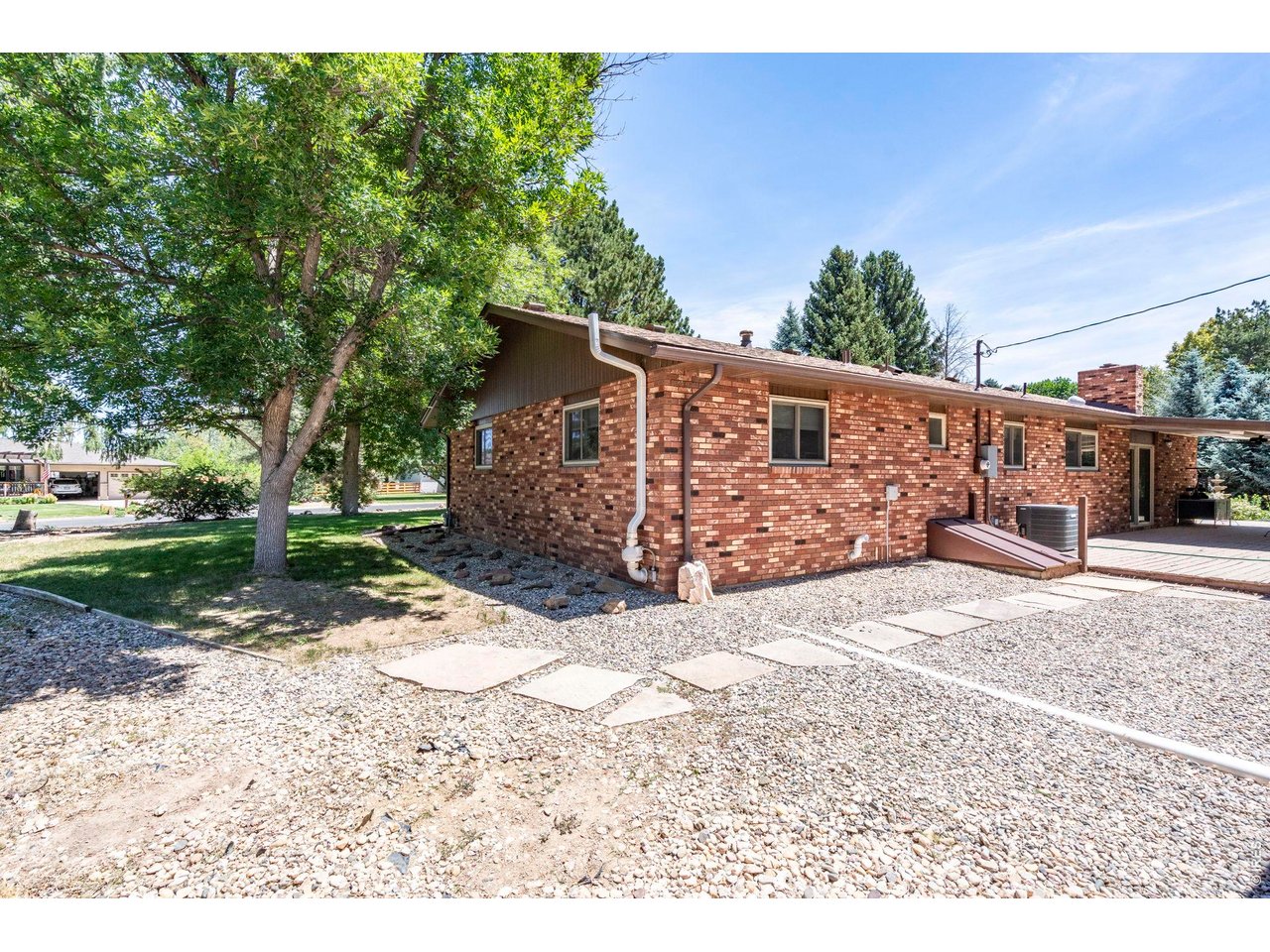 300 Ranch Acres Drive Loveland, CO 80538 - Photo 35 of 38 a view of a backyard