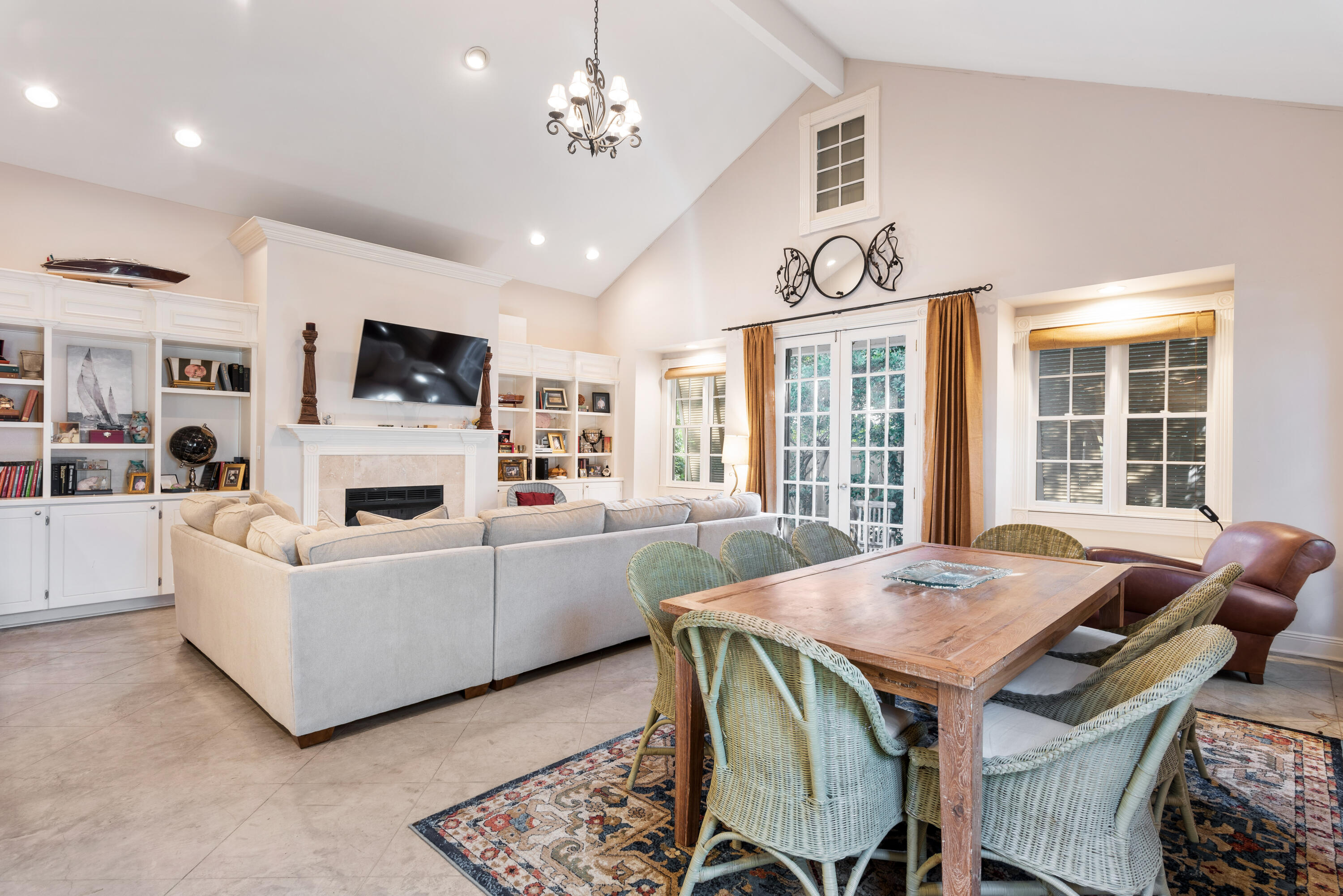 51 Rue Caribe Miramar Beach, FL 32550 - Photo 13 of 41 a living room with furniture a fireplace and flat screen tv