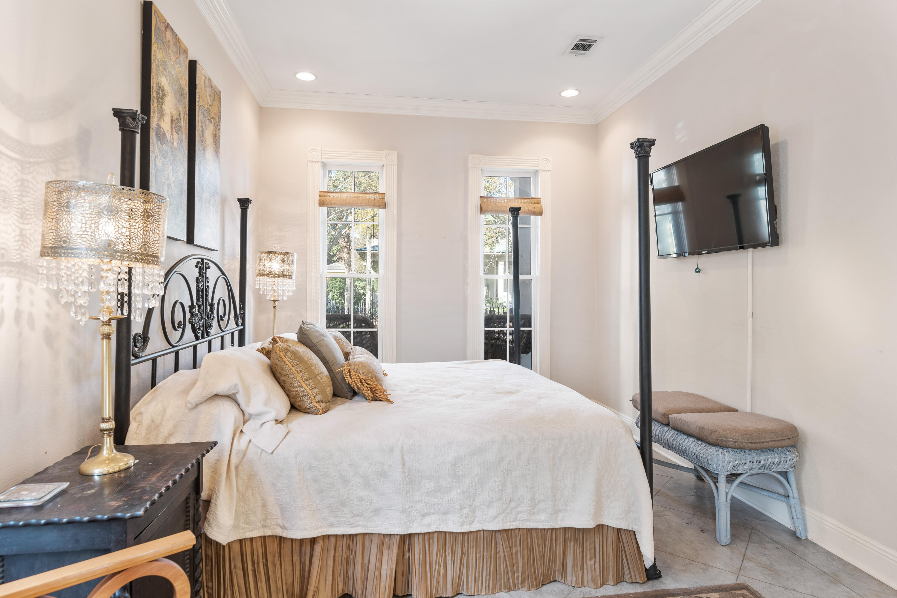 51 Rue Caribe Miramar Beach, FL 32550 - Photo 26 of 41 a bedroom with a bed a chair and glass door