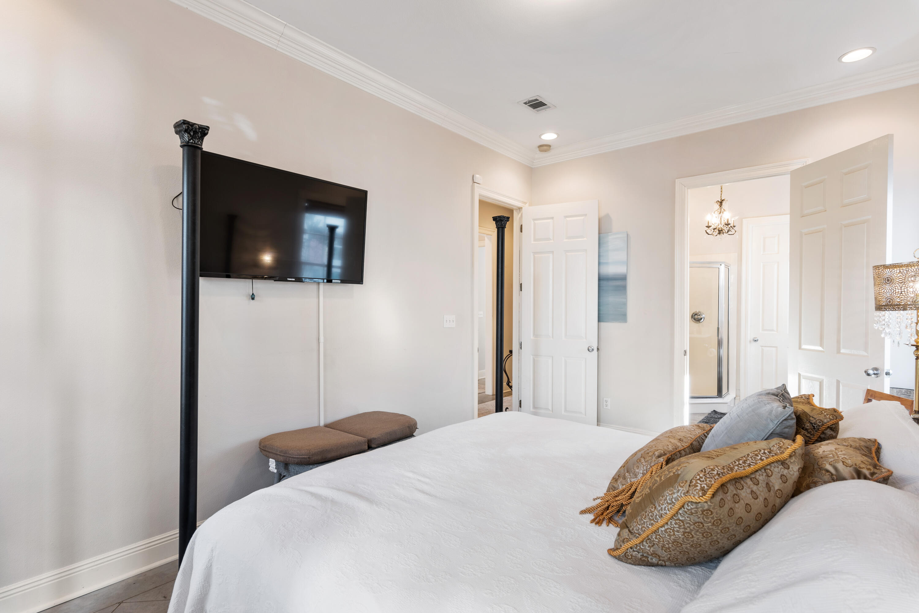 51 Rue Caribe Miramar Beach, FL 32550 - Photo 27 of 41 a bedroom with a bed and a flat screen tv