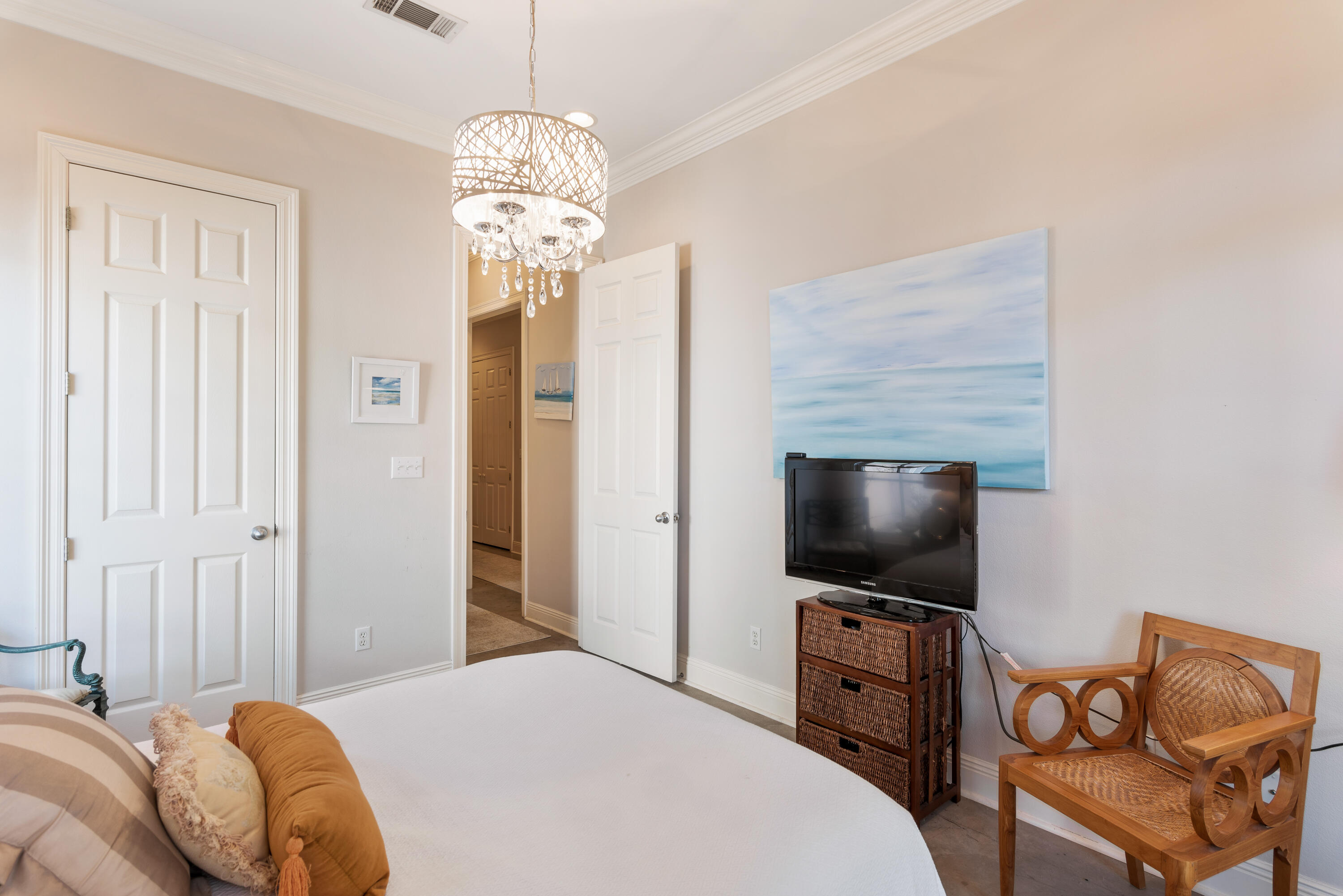51 Rue Caribe Miramar Beach, FL 32550 - Photo 31 of 41 a bedroom with a bed and a flat screen tv