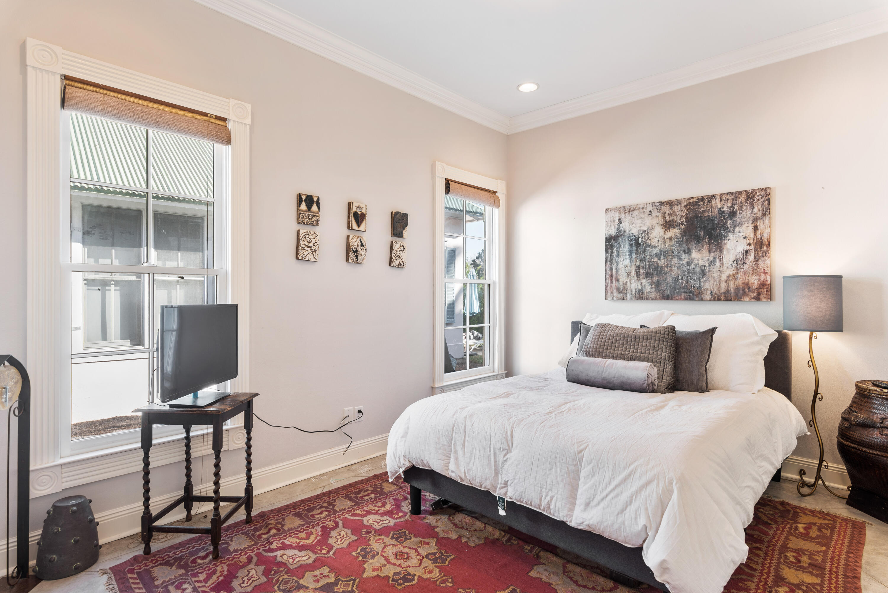 51 Rue Caribe Miramar Beach, FL 32550 - Photo 32 of 41 a bedroom with a bed and wooden floor