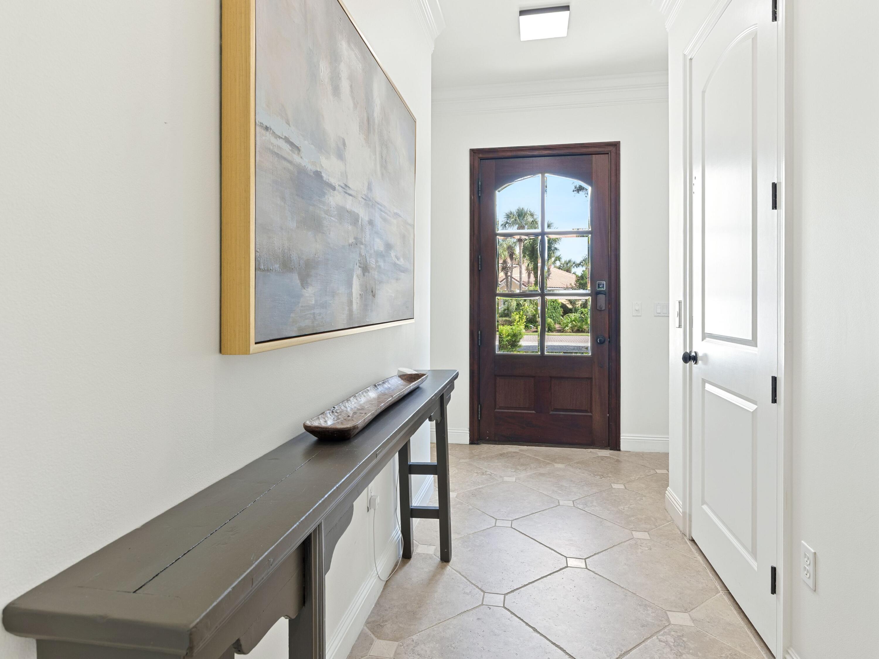 52 Tranquility Lane Destin, FL 32541 - Photo 12 of 65 a view of an entryway with wooden floor