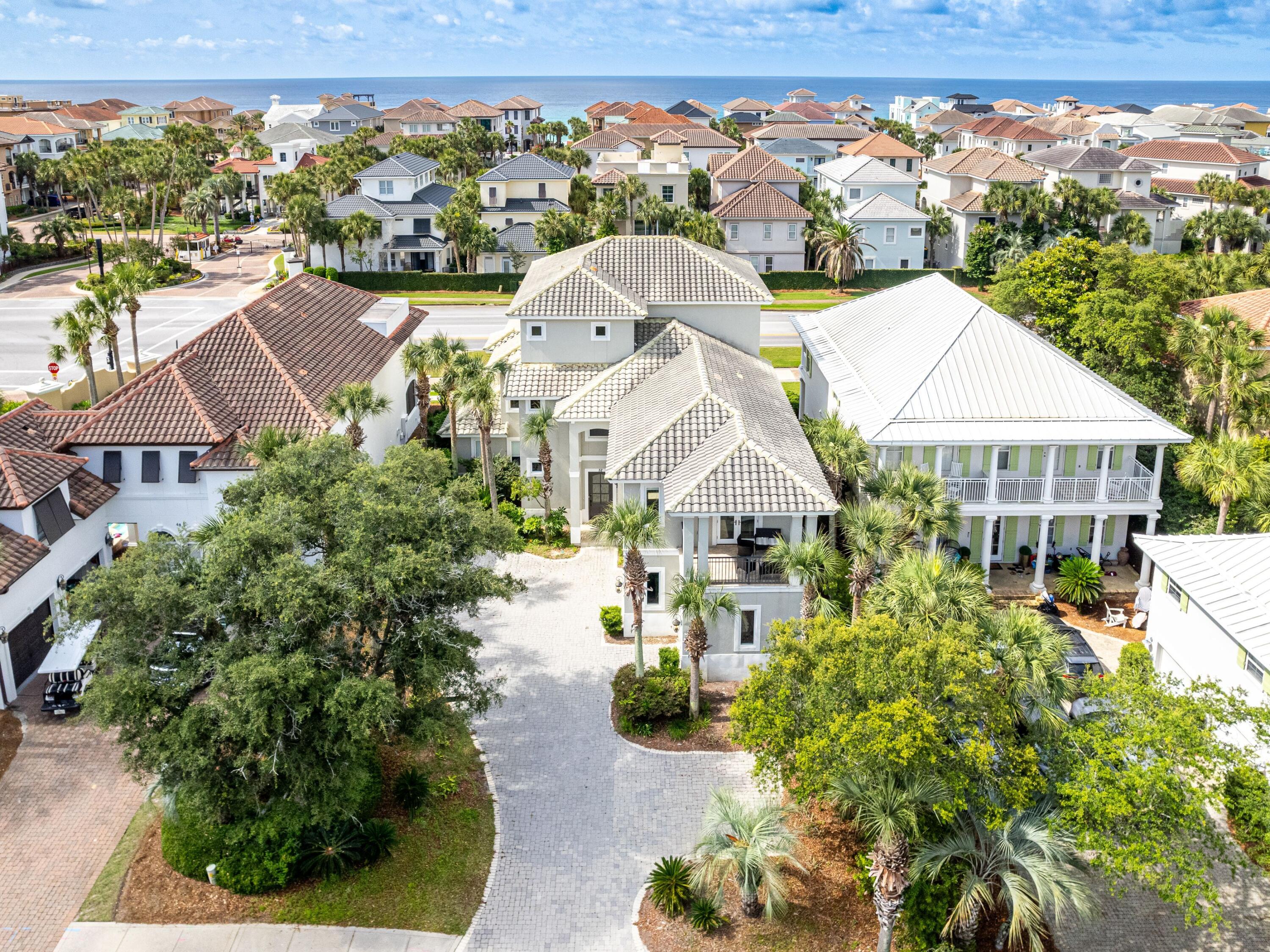 52 Tranquility Lane Destin, FL 32541 - Photo 2 of 65 an aerial view of multiple houses with yard