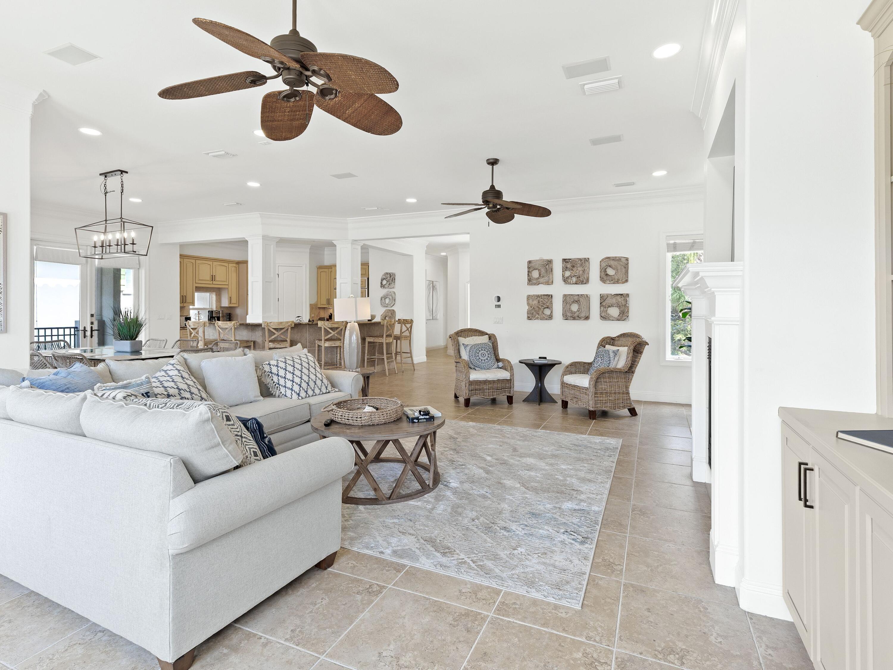 52 Tranquility Lane Destin, FL 32541 - Photo 30 of 65 a living room with furniture and a chandelier
