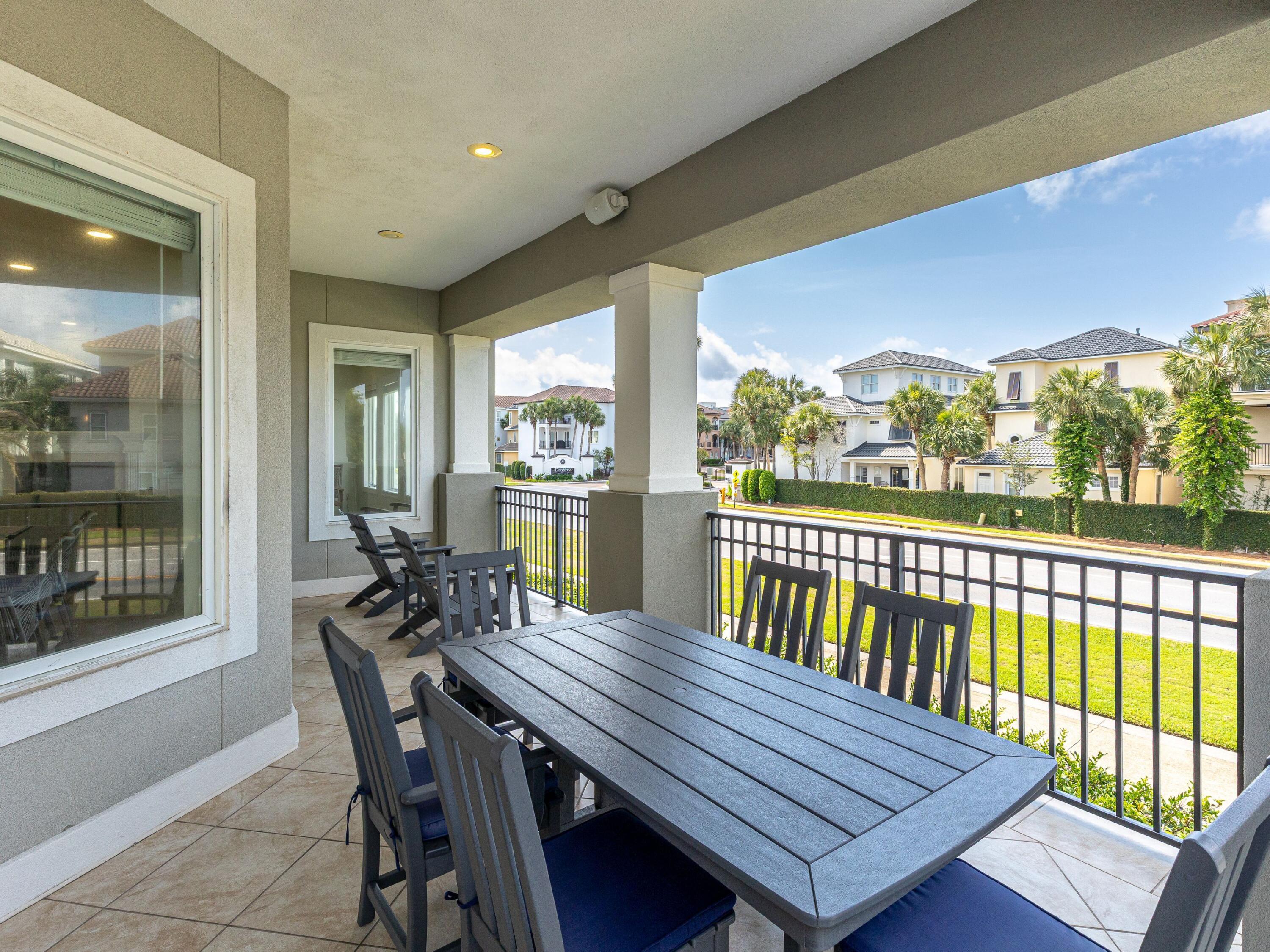 52 Tranquility Lane Destin, FL 32541 - Photo 38 of 65 a view of a dining room with furniture window and wooden floor