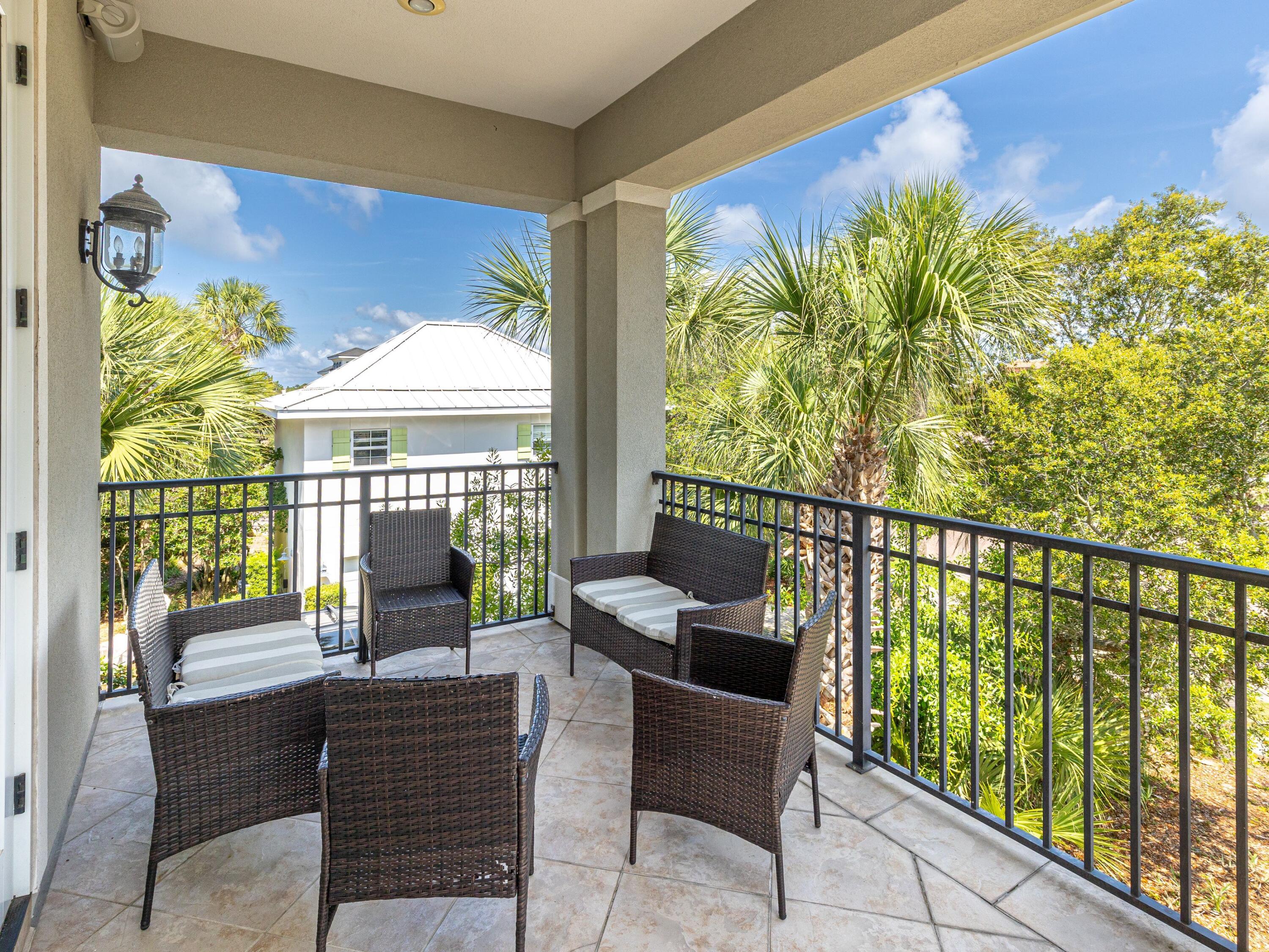 52 Tranquility Lane Destin, FL 32541 - Photo 44 of 65 a view of a two chairs in the balcony