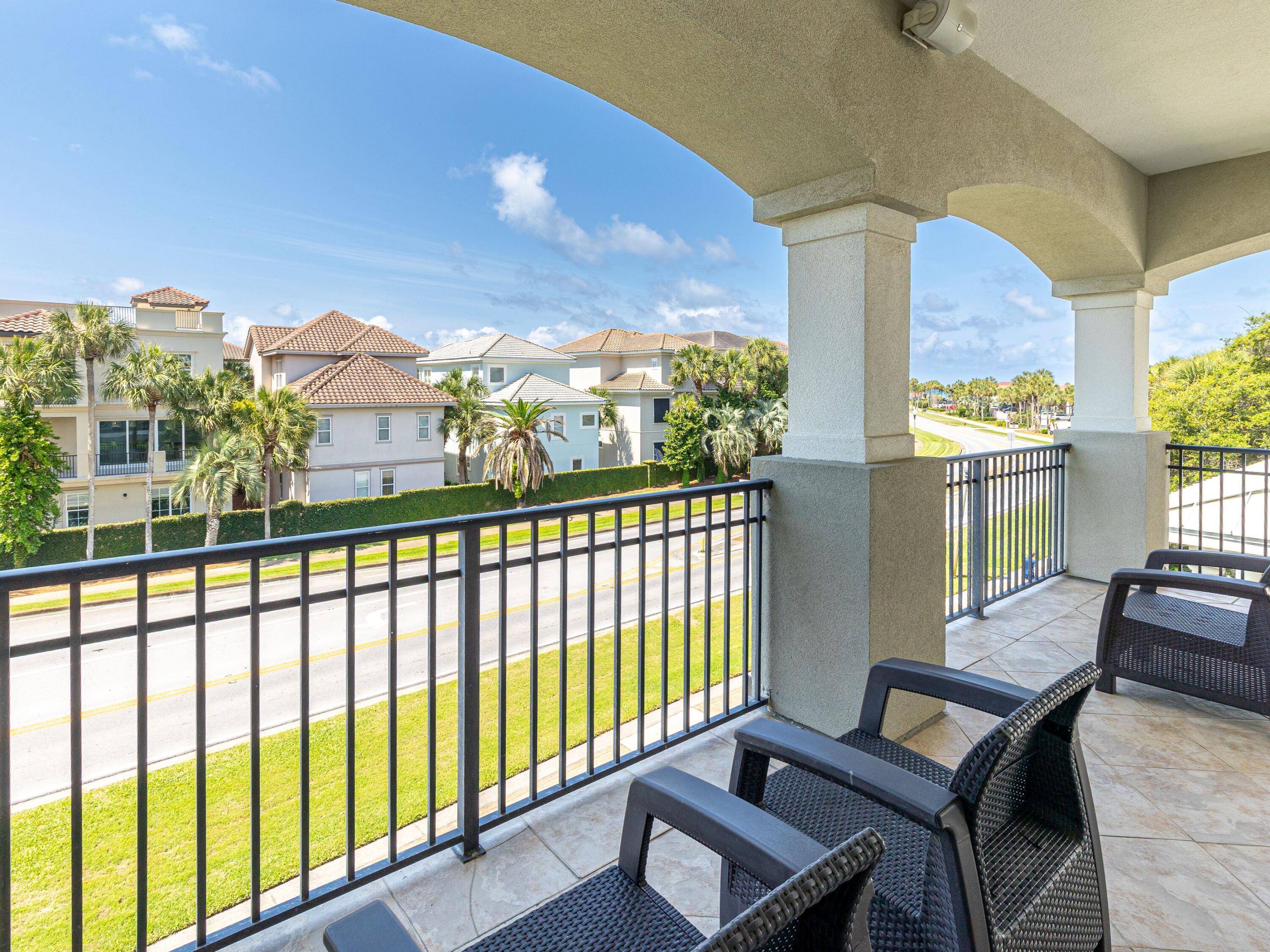 52 Tranquility Lane Destin, FL 32541 - Photo 51 of 65 a view of a city from a balcony