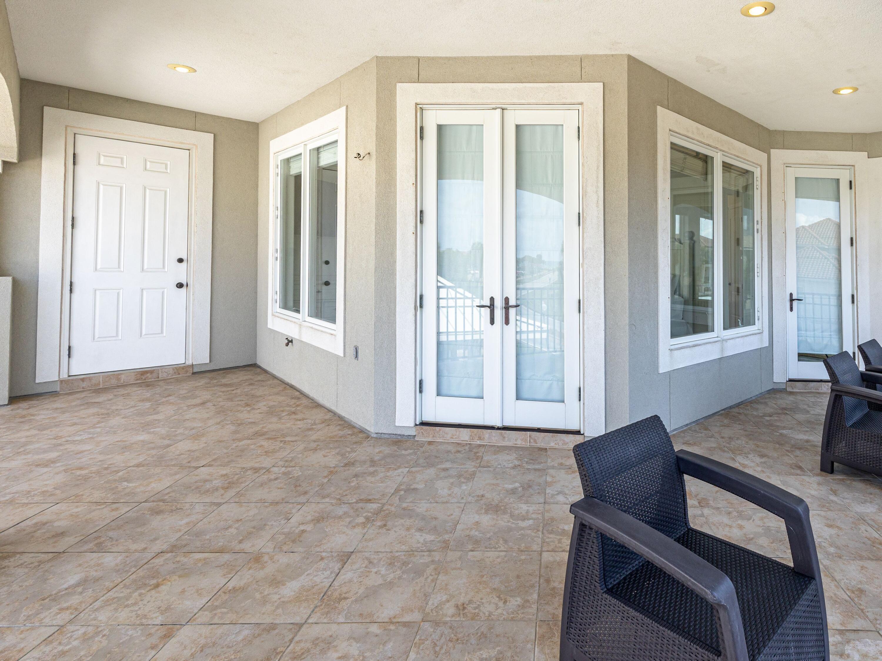 52 Tranquility Lane Destin, FL 32541 - Photo 53 of 65 a view of livingroom with furniture and windows