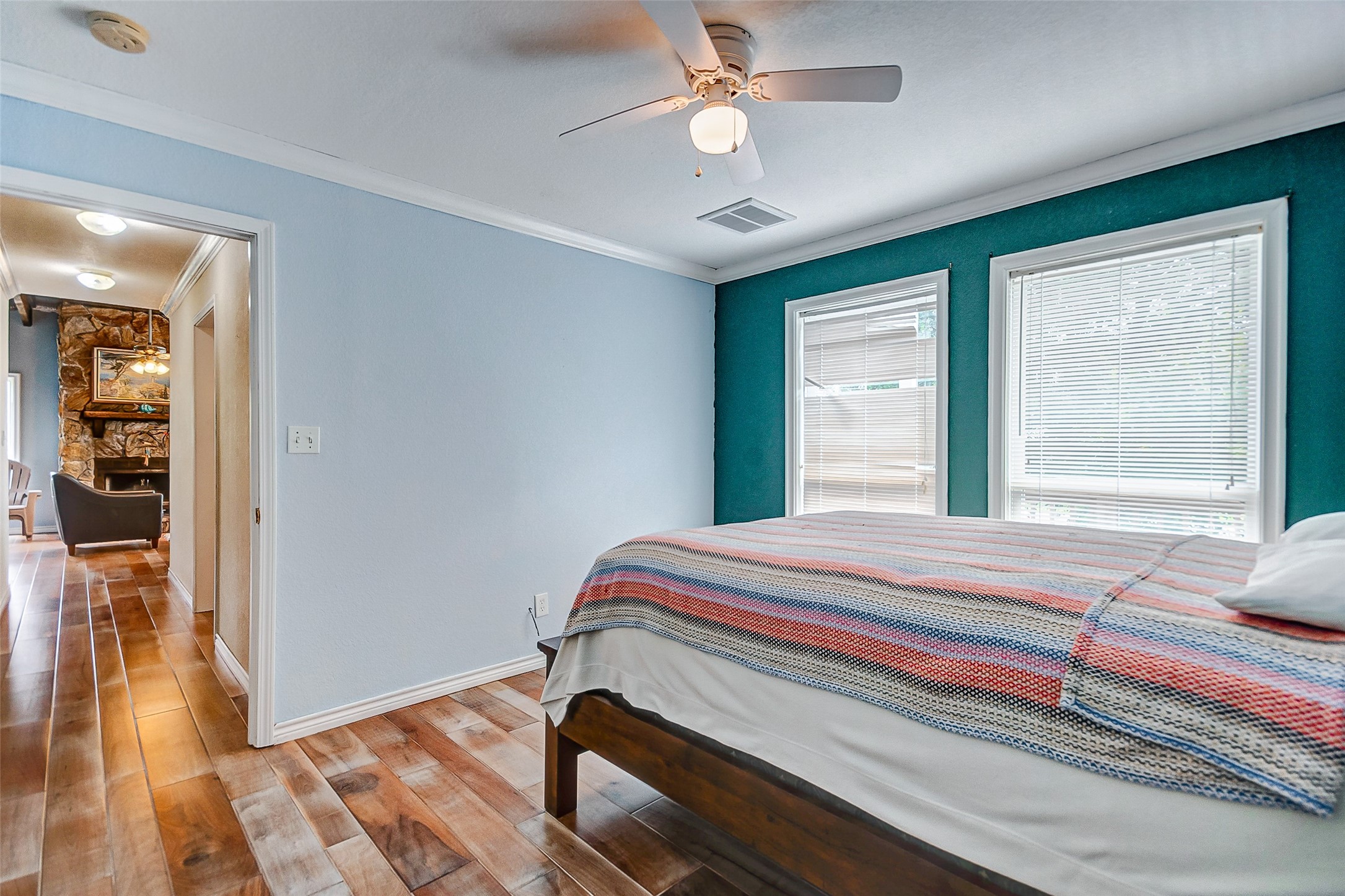 2101 7th Street High Island, TX 77650 - Photo 16 of 33 a bedroom with bed and a window