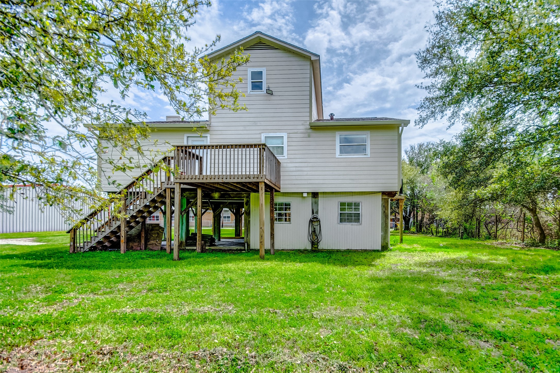 2101 7th Street High Island, TX 77650 - Photo 2 of 33 a view of a house with a yard and sitting area