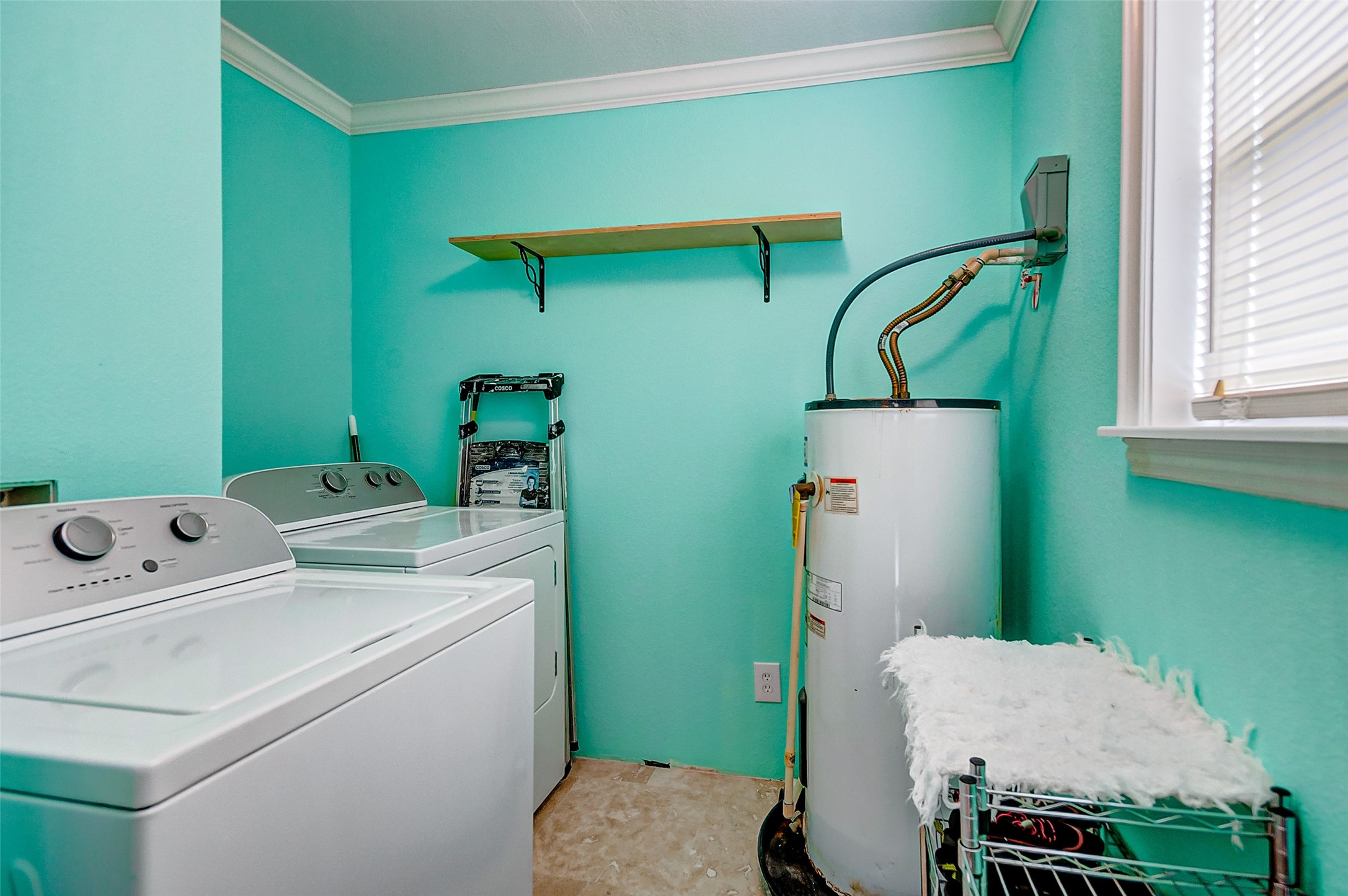 2101 7th Street High Island, TX 77650 - Photo 21 of 33 a bathroom with a sink a toilet and a mirror