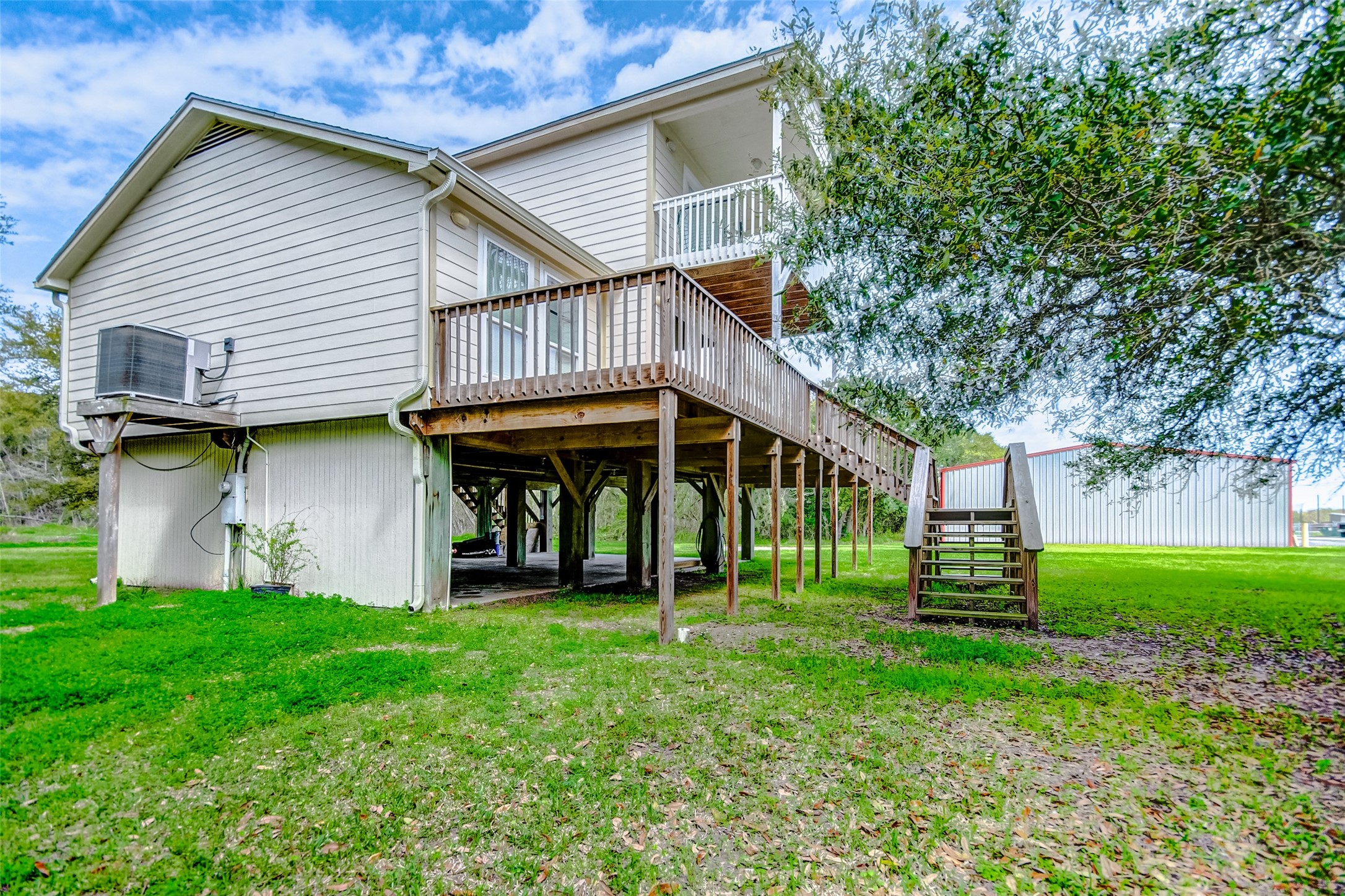 2101 7th Street High Island, TX 77650 - Photo 27 of 33 a front view of a house with garden