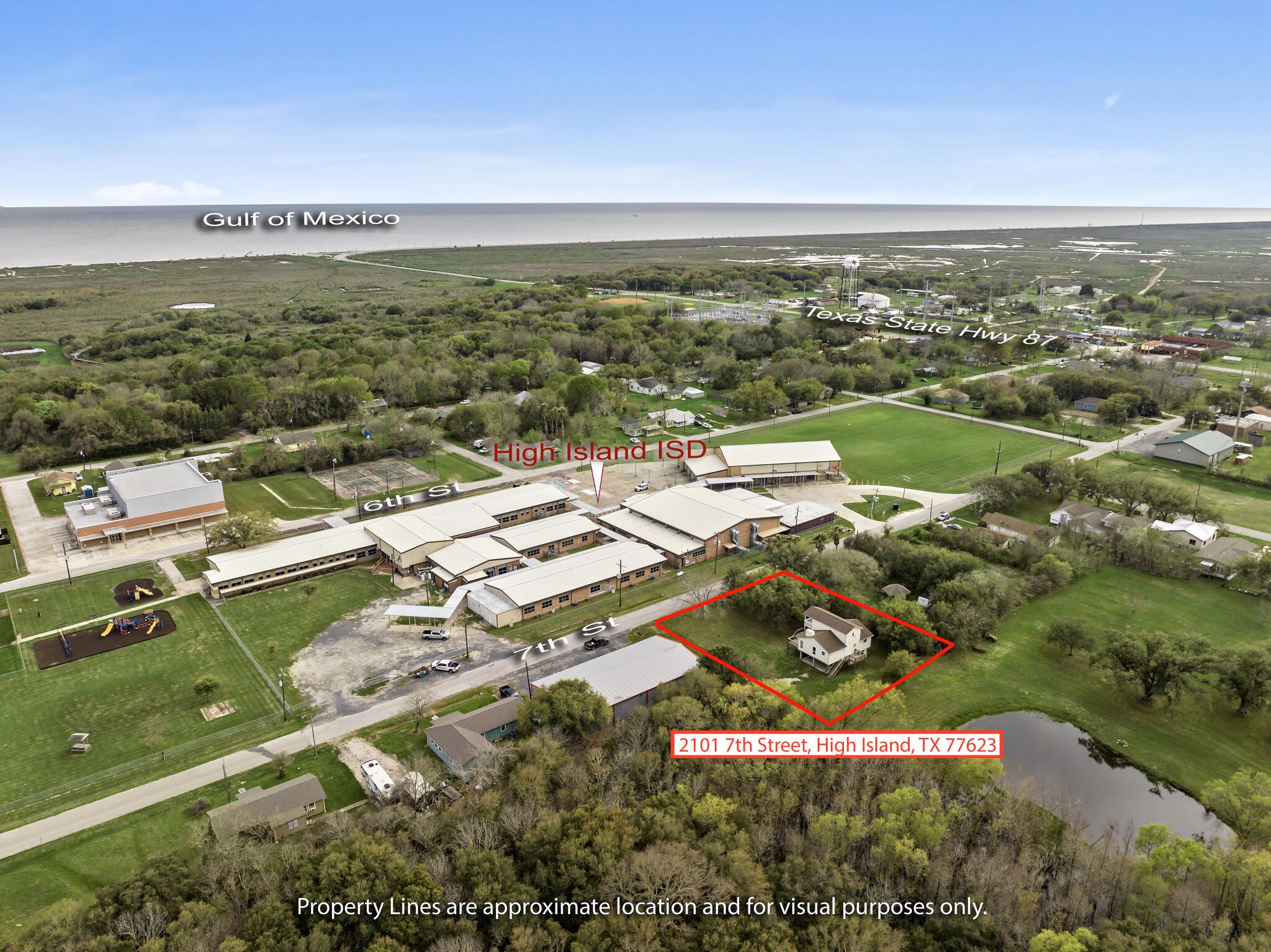2101 7th Street High Island, TX 77650 - Photo 29 of 33 an aerial view of residential houses with outdoor space