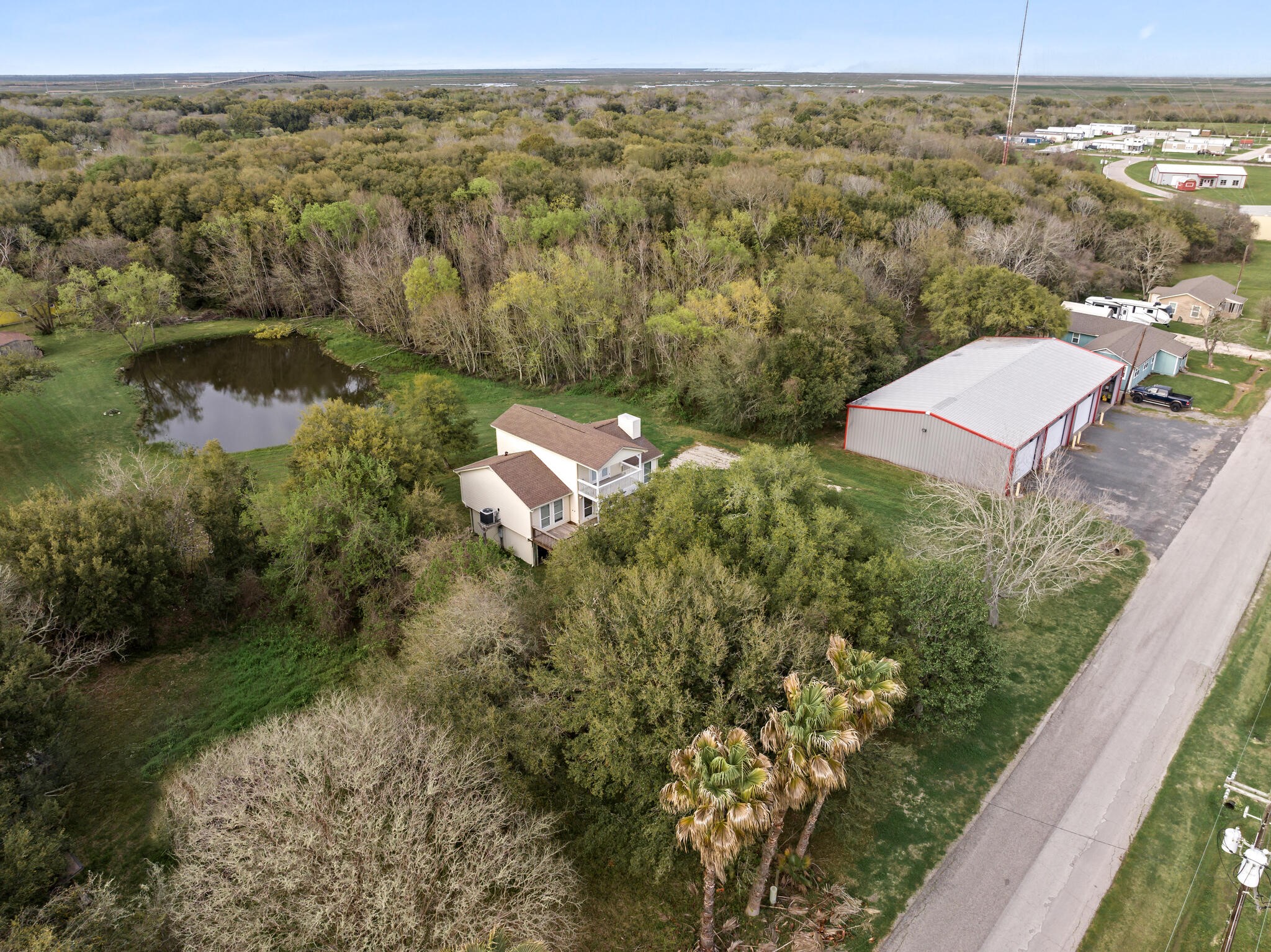 2101 7th Street High Island, TX 77650 - Photo 33 of 33 a view of a lake with a mountain in the background