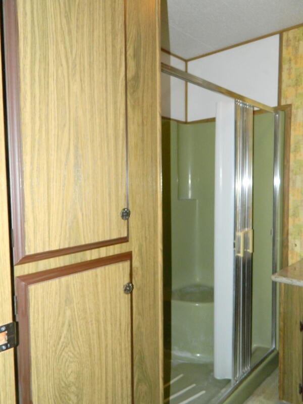 2373 Webster Road Grants Pass, OR 97526 - Photo 27 of 47 Shower and Cubbard in Master Bathroom