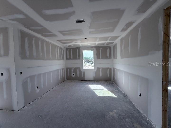 30141 Misty Pnes Road Mount Dora, FL 32757 - Photo 12 of 34 a big room with chandelier fan and windows