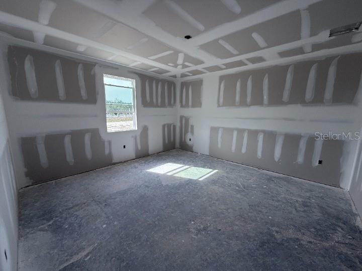 30141 Misty Pnes Road Mount Dora, FL 32757 - Photo 20 of 34 a view of an empty room with a window