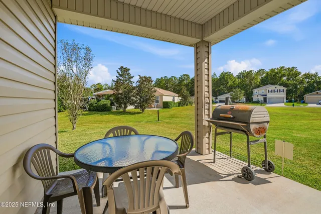 a view of storage and utility room with washer and dryer