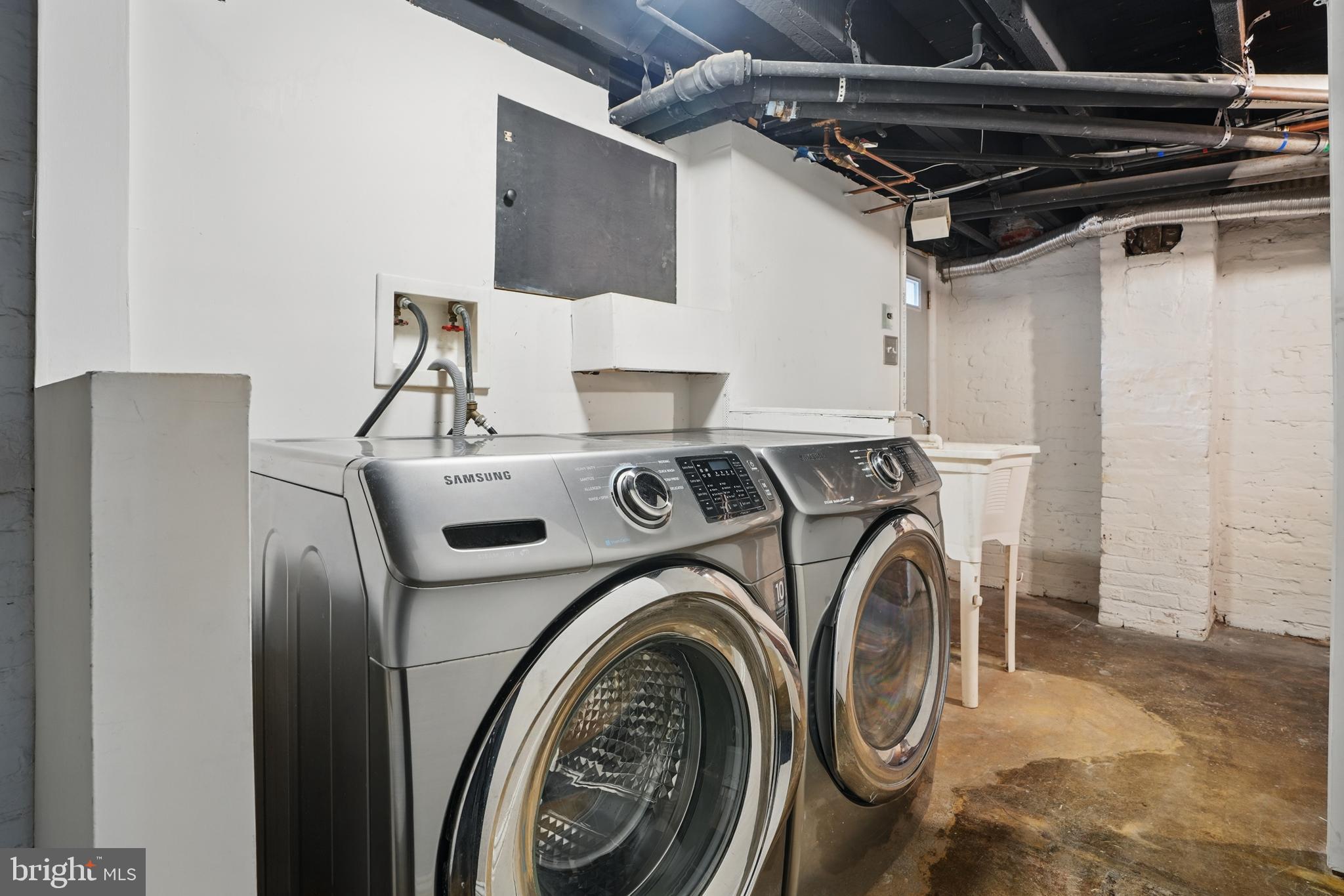 136 R Street Northeast Washington, DC 20002 - Photo 33 of 36 a utility room with dryer and washer