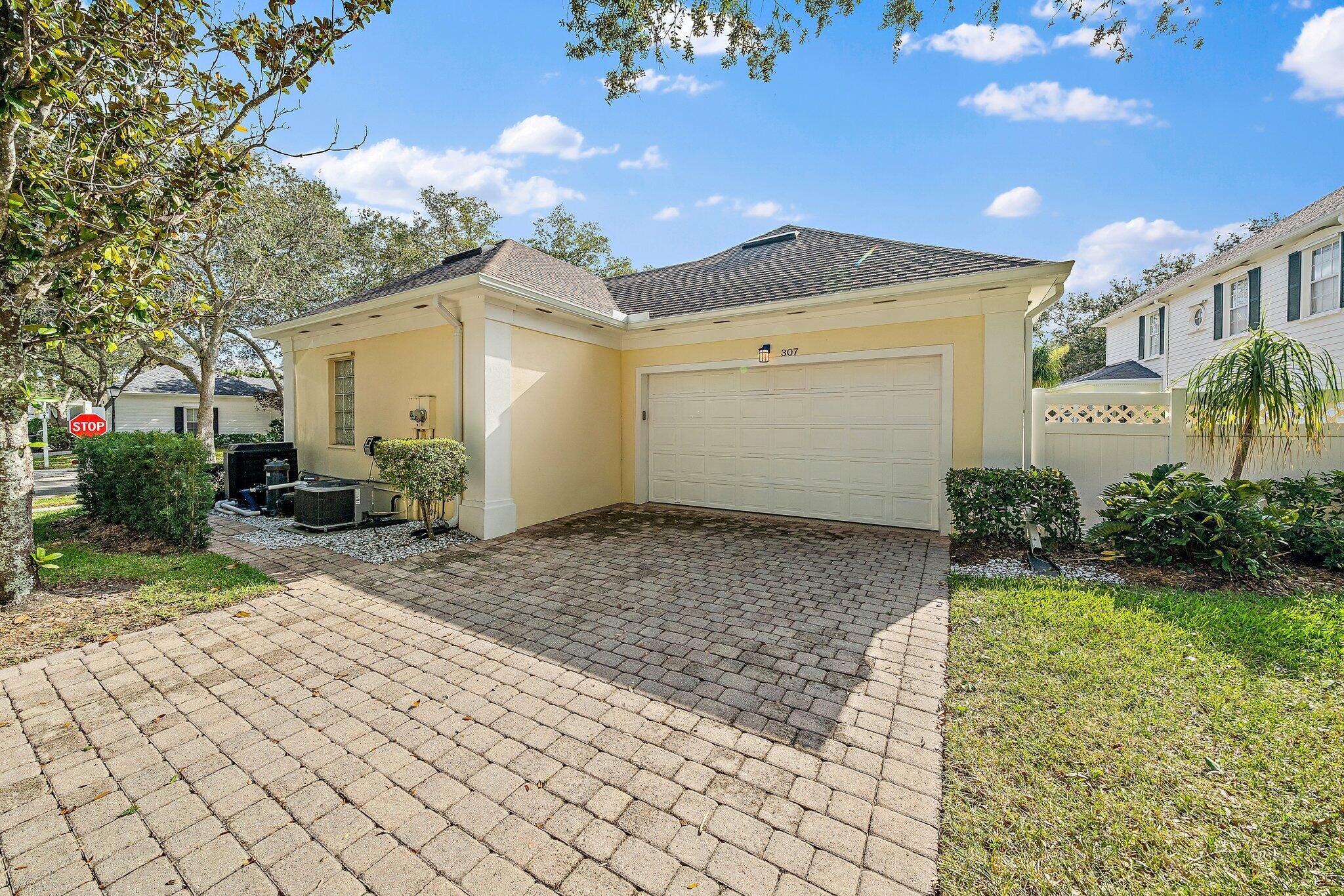 307 Sweet Bay Circle Jupiter, FL 33458 - Photo 2 of 25 307 Sweet Bay A exterior back