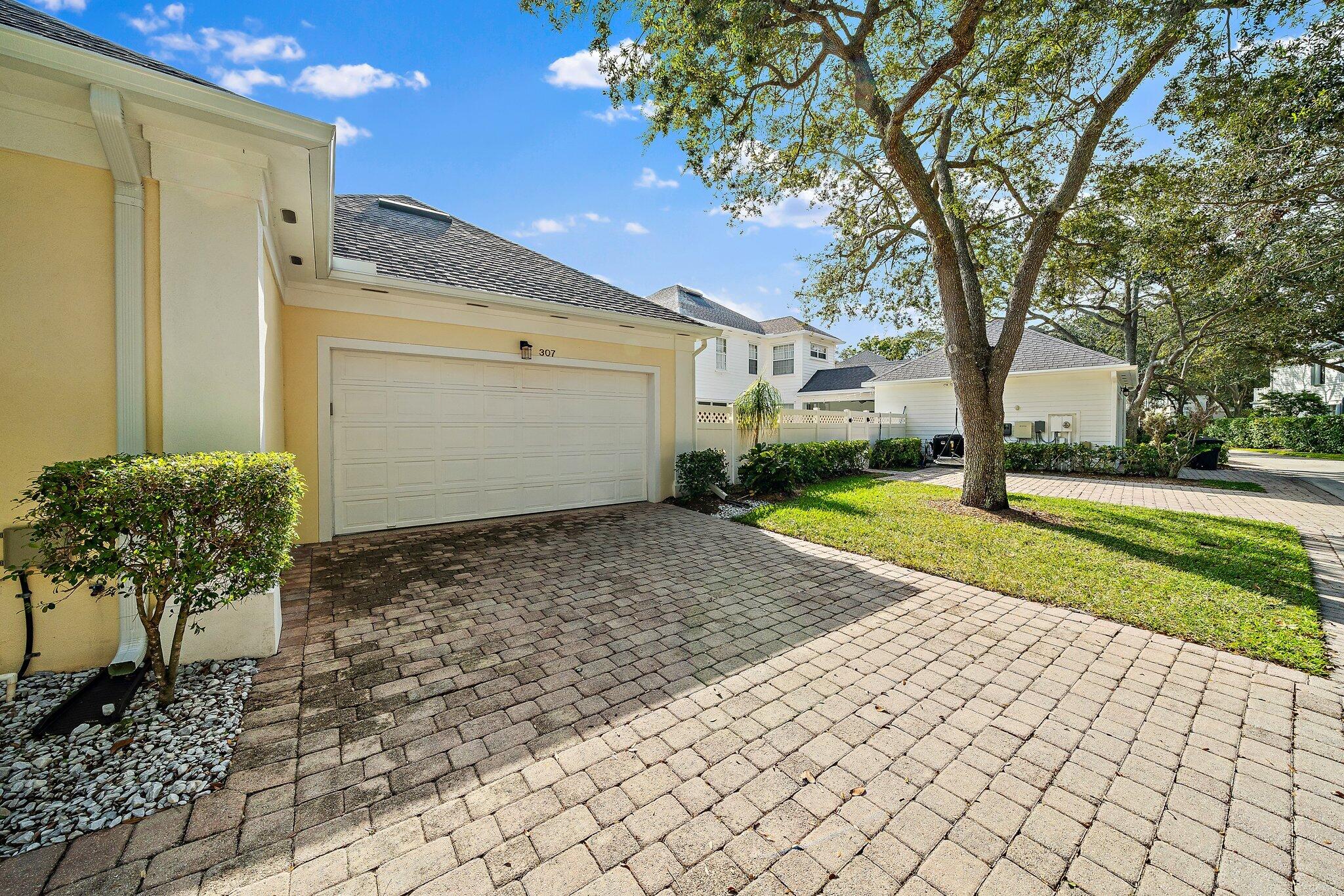 307 Sweet Bay Circle Jupiter, FL 33458 - Photo 3 of 25 307 Sweet Bay A exterior back 2