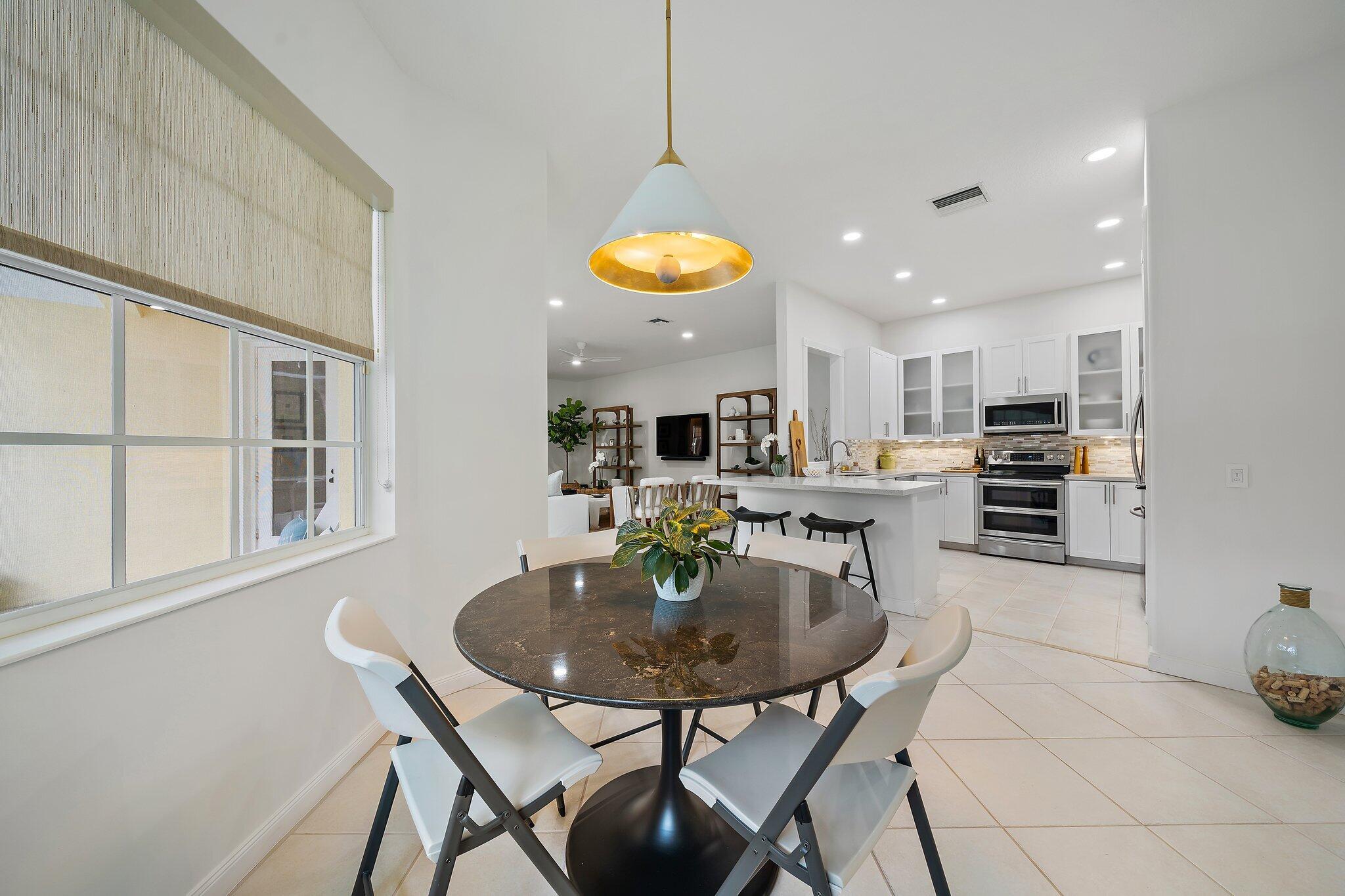 307 Sweet Bay Circle Jupiter, FL 33458 - Photo 10 of 25 307 Sweet Bay A dining area 1