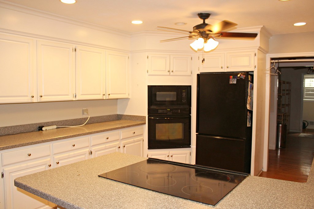 1892 Boxankle Road Forsyth, GA 31029 - Photo 3 of 20 a kitchen with stainless steel appliances granite countertop a refrigerator and a sink