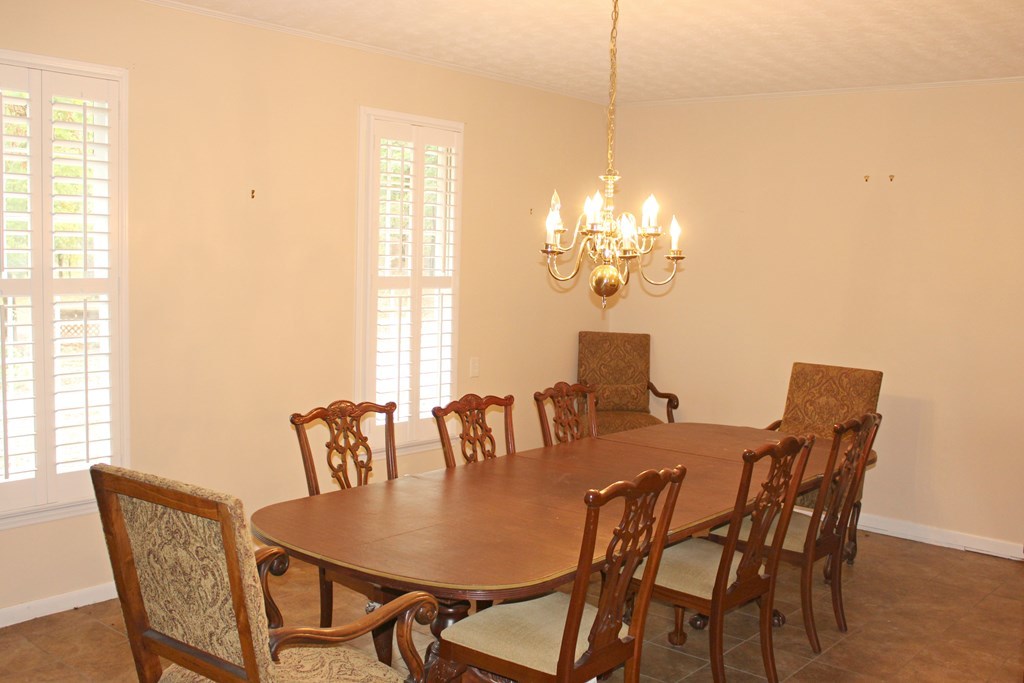 1892 Boxankle Road Forsyth, GA 31029 - Photo 5 of 20 a view of a dining room with furniture and chandelier