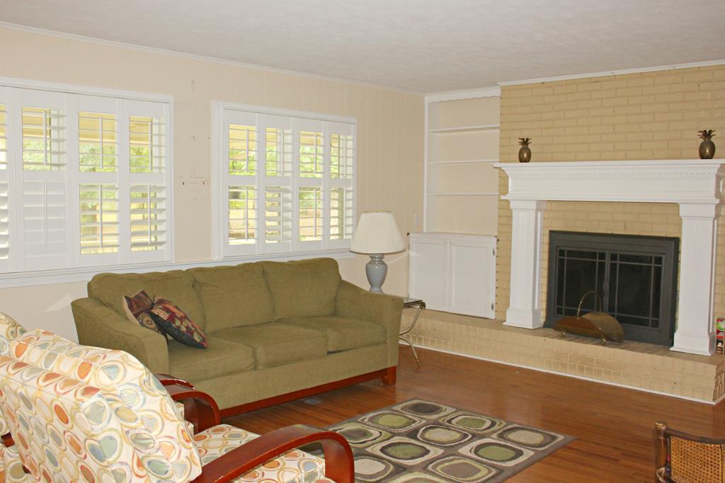 1892 Boxankle Road Forsyth, GA 31029 - Photo 6 of 20 a living room with furniture and a fireplace
