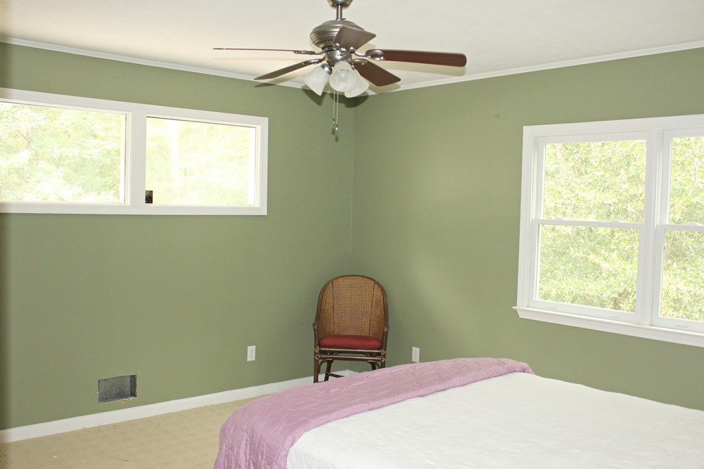 1892 Boxankle Road Forsyth, GA 31029 - Photo 10 of 20 a bedroom with a bed and a window