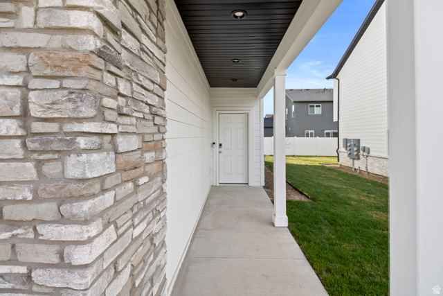 1262 West 500 South Logan, UT 84321 - Photo 38 of 39 Covered entry with stone veneer and horizontal siding
