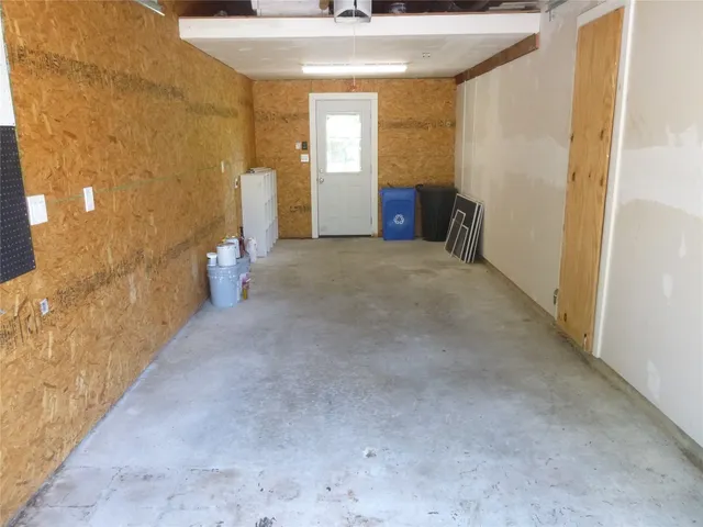 a view of a bathroom with a sink and a shower
