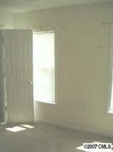 11516 Chapeclane Road Charlotte, NC 28278 - Photo 4 of 5 a view of a window in an empty room