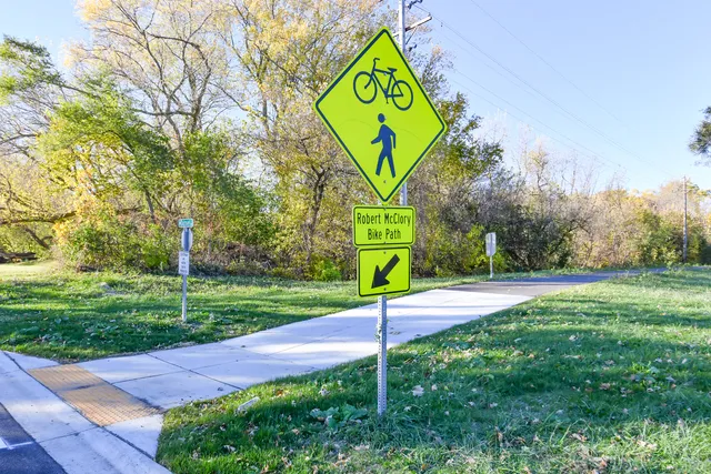 a sign that is sitting on the grass