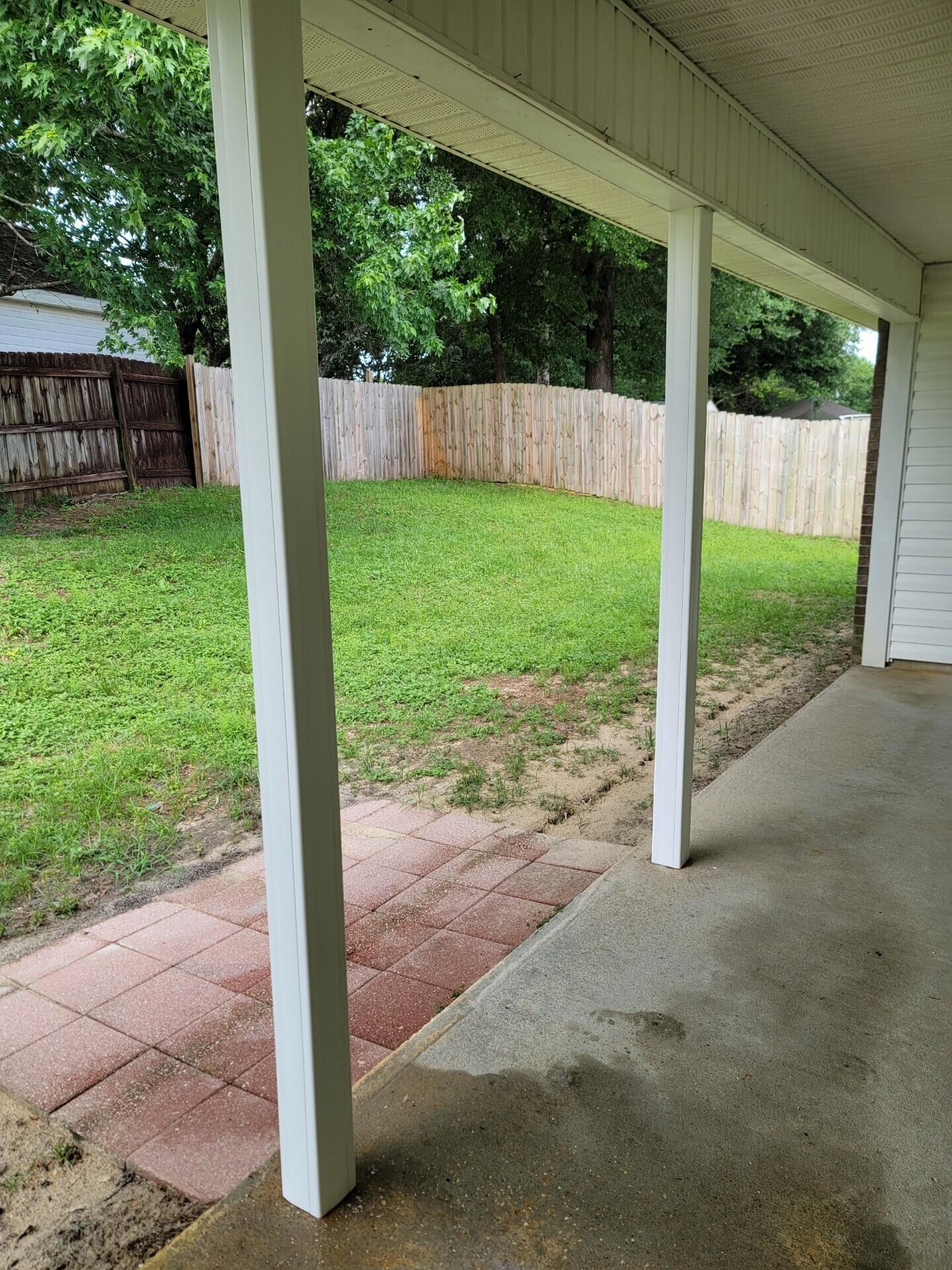 4491 Old Antioch Road Crestview, FL 32536 - Photo 13 of 15 a view of a backyard with a garden and plants