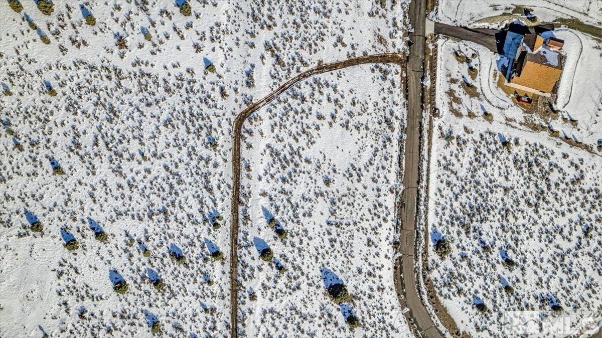 1534 Bolton Loop, Unit 7 Gardnerville, NV 89410 - Photo 22 of 30 a bathroom with a shower curtain