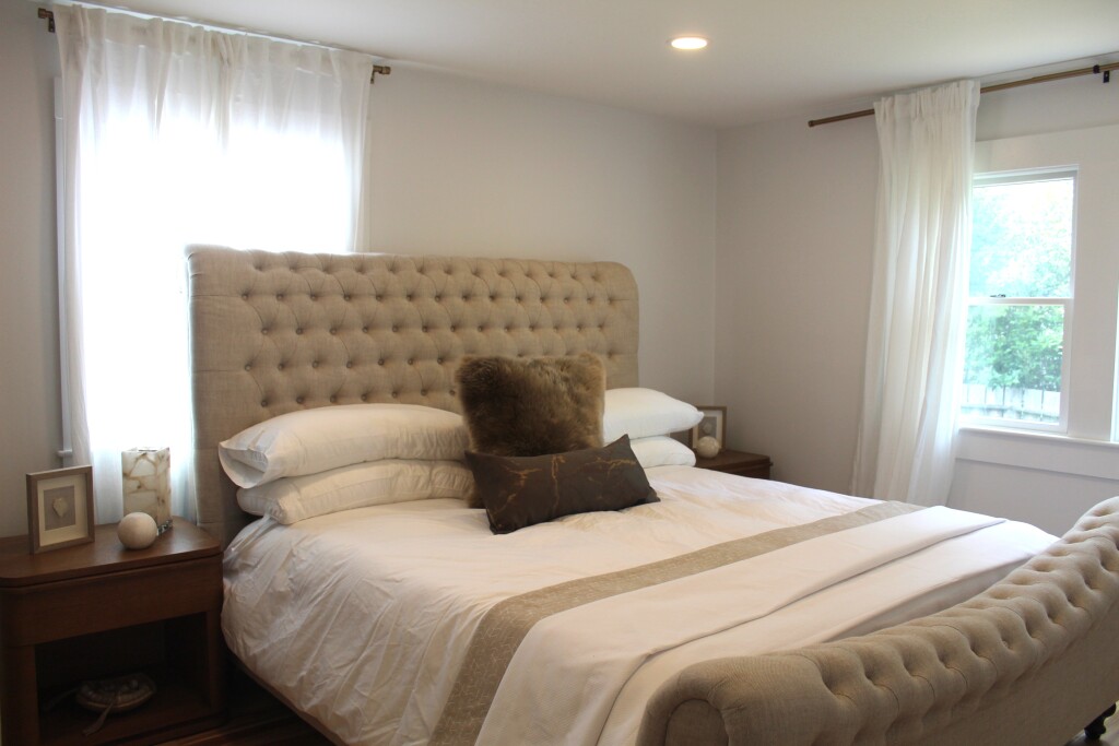 33 Bartlett Road Nantucket, MA 02554 - Photo 11 of 29 a bedroom with a bed and a window
