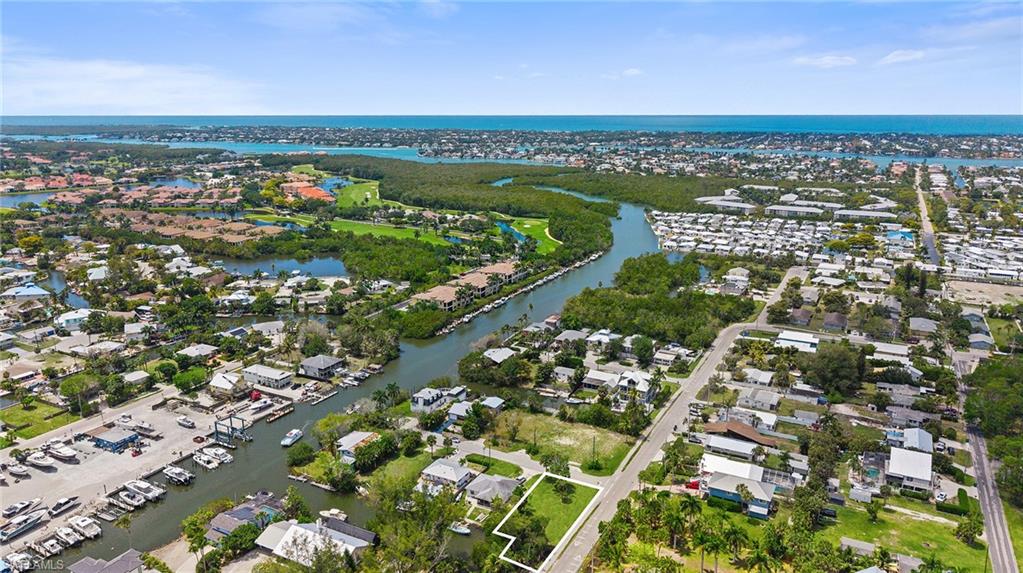 Orange Street Naples, FL 34112 - Photo 2 of 6 a view of a city with an ocean