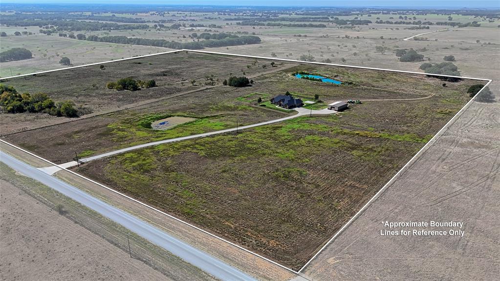 1150 Lone Star Road Bowie, TX 76230 - Photo 36 of 38 an aerial view of a pool