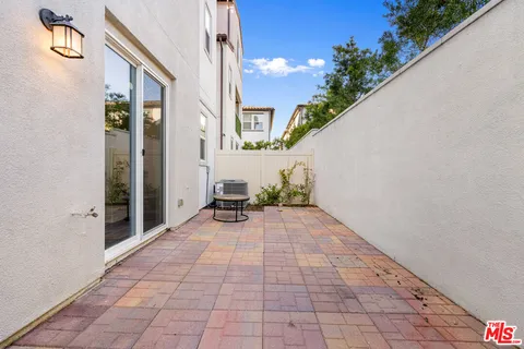 a view of street with sitting area